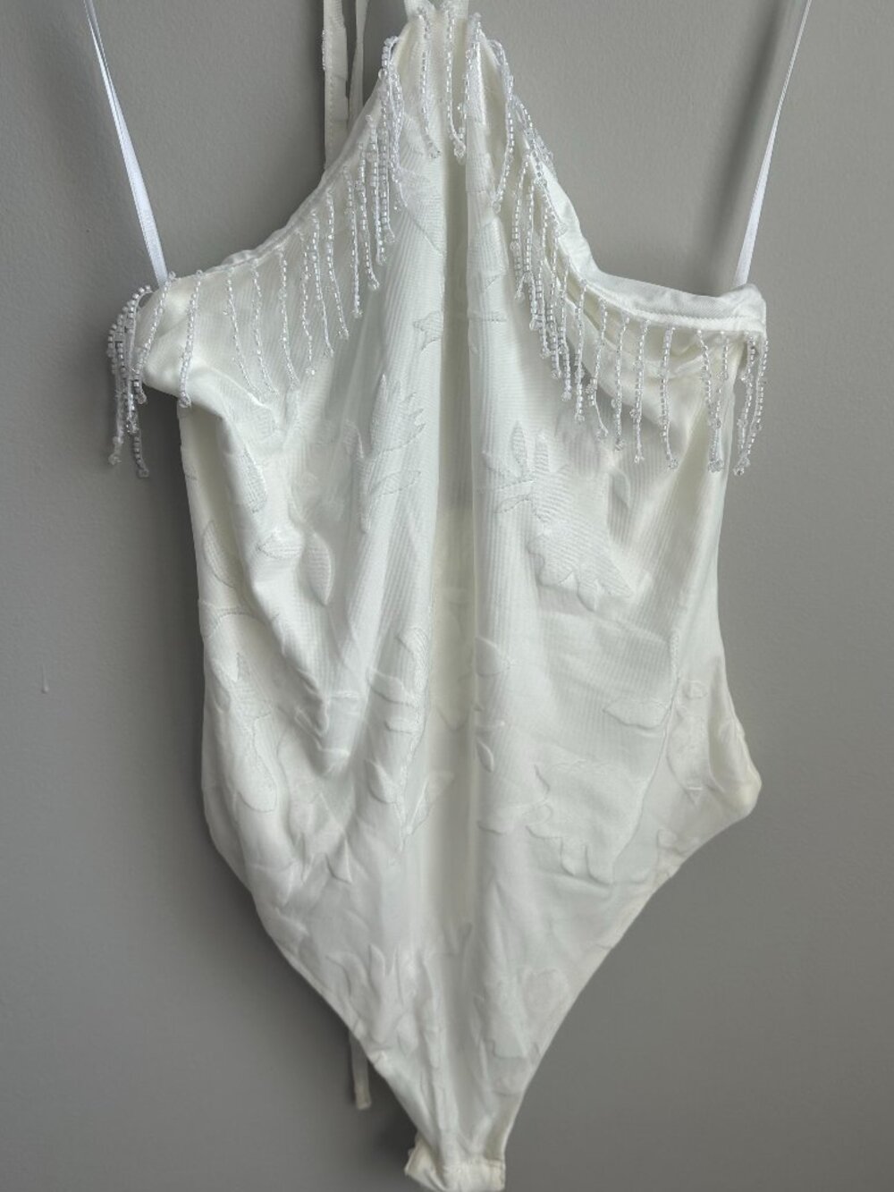 Princess Polly white body suite  with beaded tassles size small